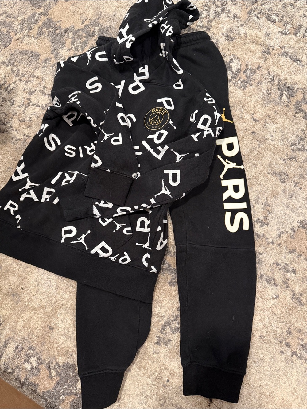 Jordan Black PSG Allover Logo Hoodie with Gold Accents
